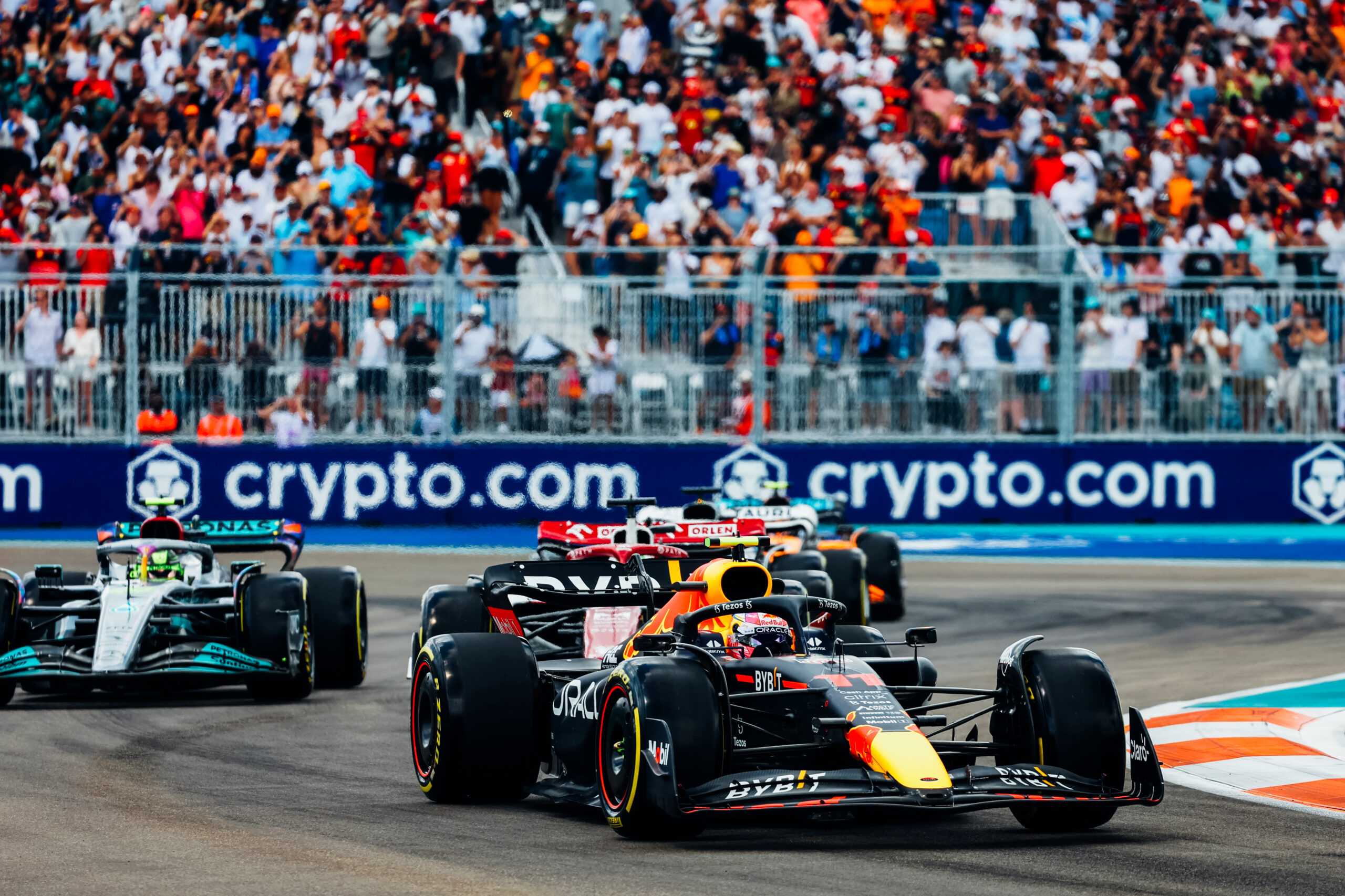 Cars racing on a Formula 1 Circuit