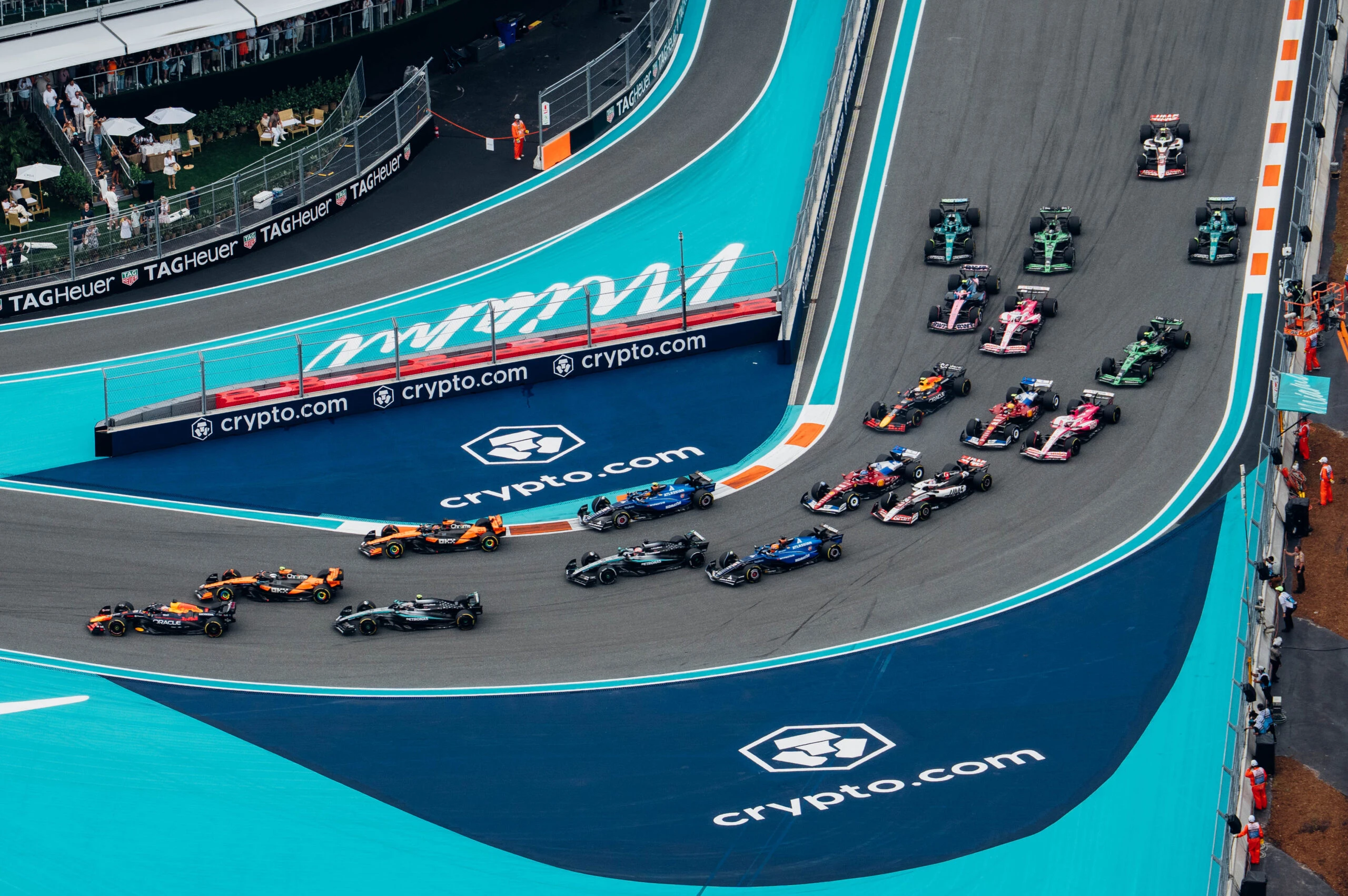 Aerial view of cars rounding a turn at the Miami Grand Prix