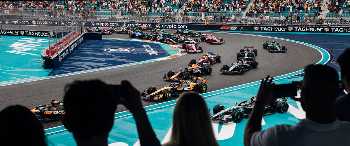 F1 Miami Banner Image - F1 Cars Racing around a turn