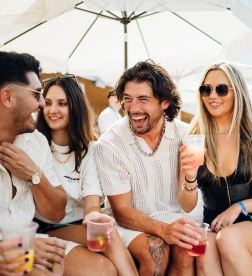 Five individuals enjoying an F1 Event
